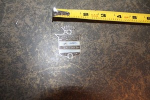 Vintage Cadillac emblem dashboard lubrication reminder plate, clean and nice
