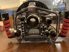 Ikelite/Nikon Underwater camera system with strobe and numerous lenses.