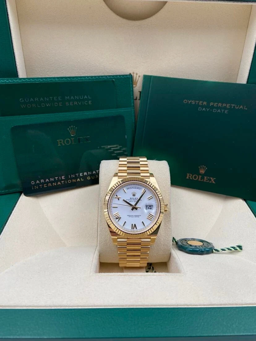 Rolex day date 40 top yellow gold white dial