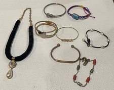 Small Size 8 piece costume jewelry lot w/ 1 Necklace and 7 Bracelets