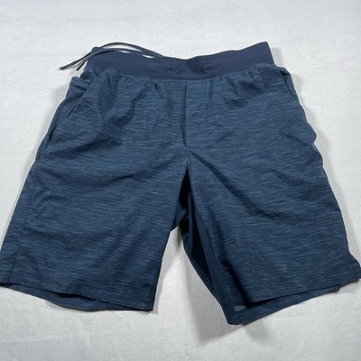 Luluemon running shorts quick dry  zipper pockets draw string shorts medium