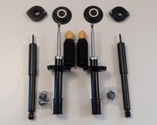 Satz 4 Gasdruck Stoßdämpfer Domlager Staubschutz Opel Corsa B vorne hinten VA HA