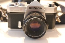 Konica Autoreflex T 35 mm SLR camera with case and strap