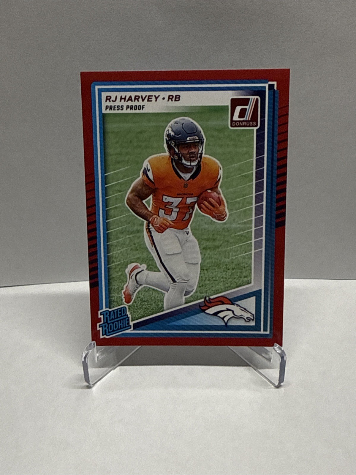 2025 Donruss RJ Harvey Rated Rookie Press Proof Red RC #312 Broncos