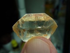 UNPOLISHED DOUBLE TERMINATED SUPER CLEAR TANNED BY OXIDES QUARTZ  LY 497