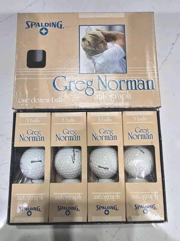 VINTAGE SPALDING GREG NORMAN DOZEN GOLF BALL BOX WITH FOUR SLEEVES LATE 1980'S