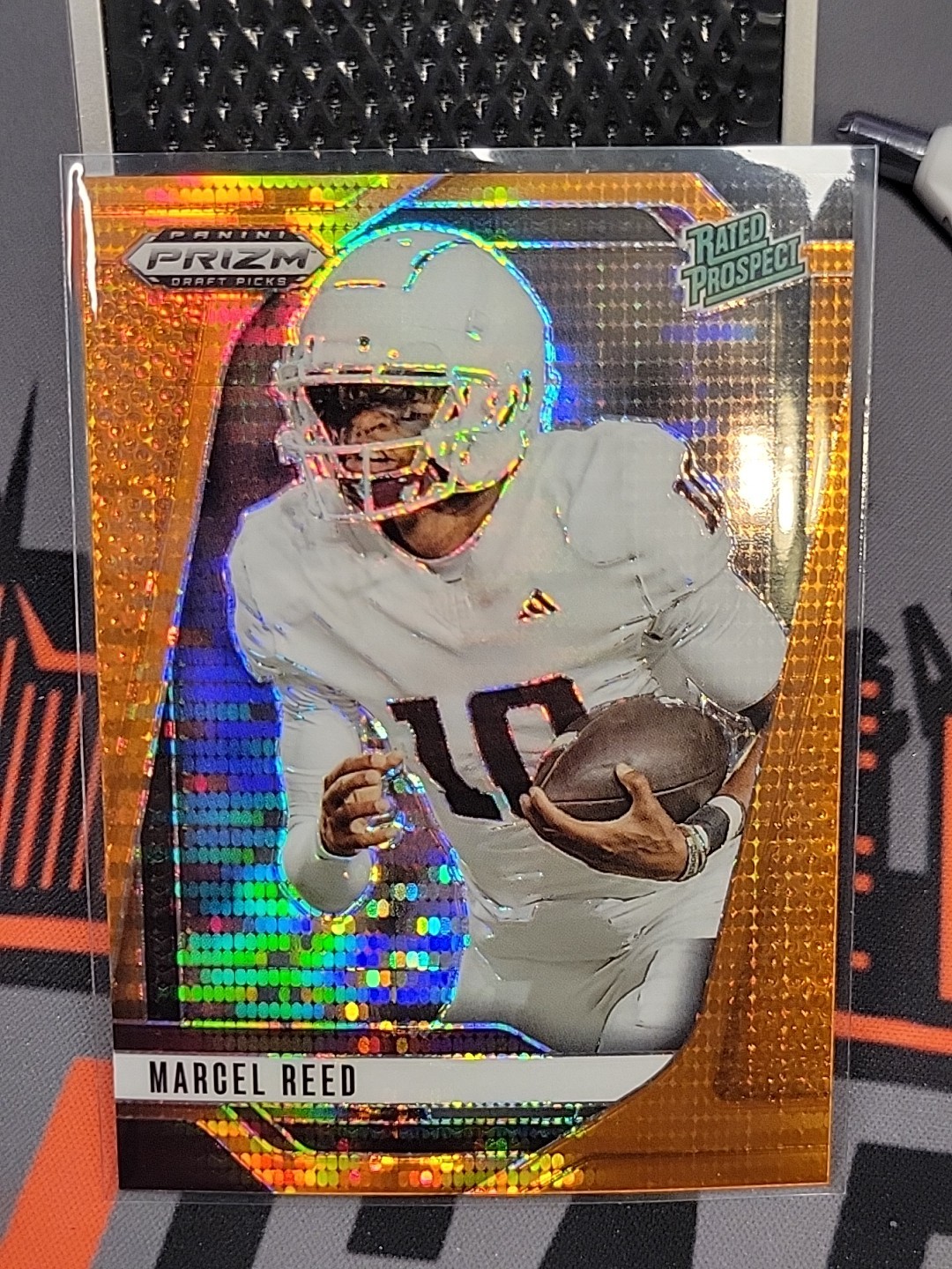 2025 Prizm Draft Picks Marcel Reed Rated Prospect Orange Pulsar /75