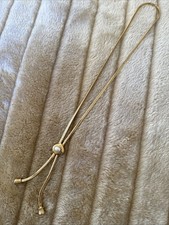 Vintage MONET lariat / Slide Necklace In Excellent Condition Gold Tone