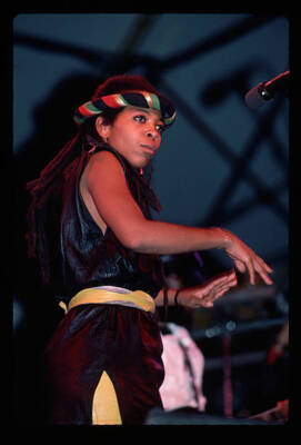 Reggae singer Puma Jones of Black Uhuru dances on stage Historic Old Photo