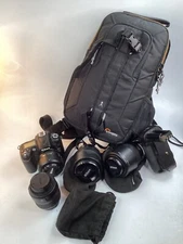 NIKON D90 Package Including 4 Lenses, winder,battery,filters and bag (F5)