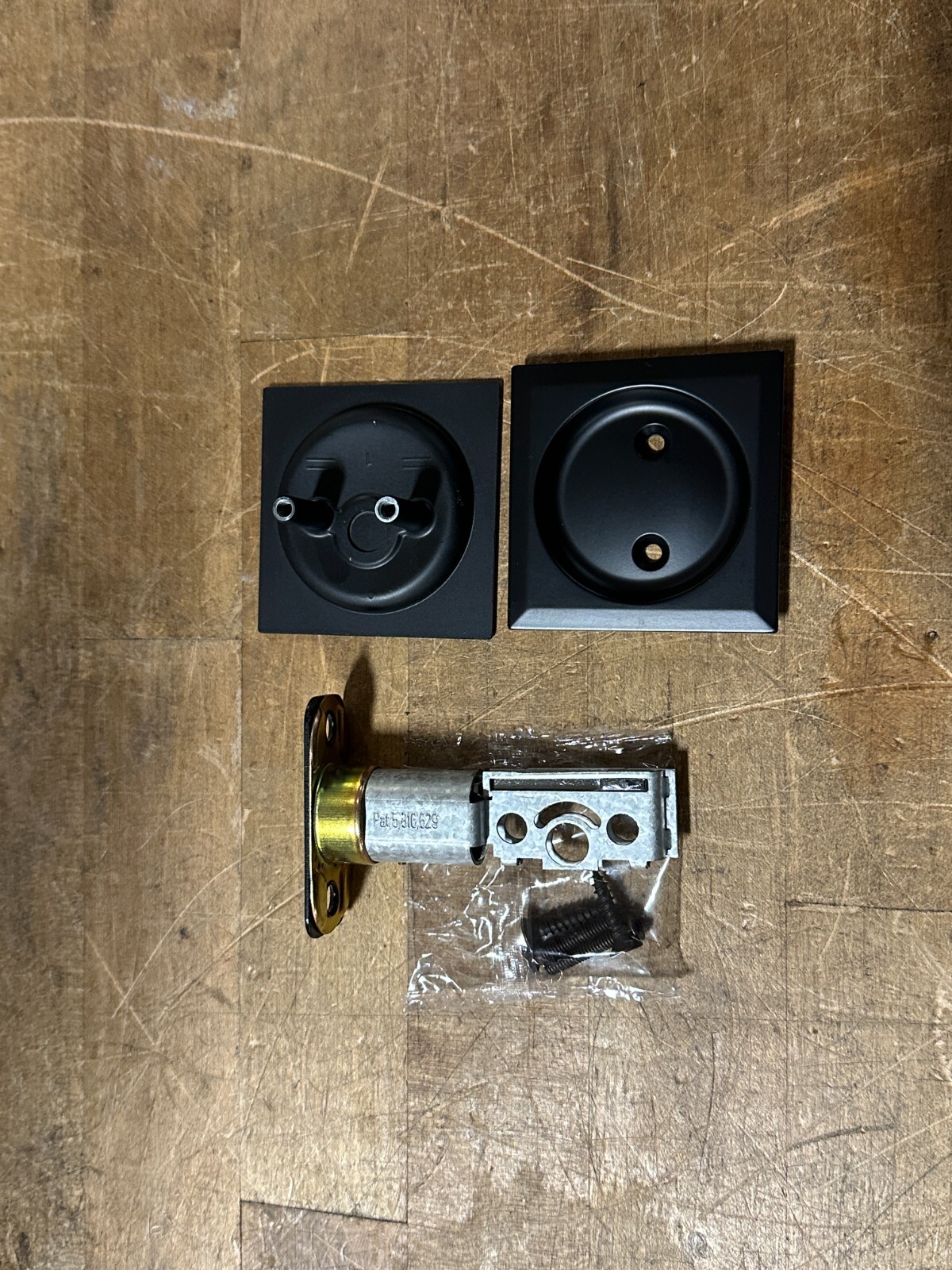 Kwikset Square Pocket Door Lock Passage in Matte Black 93340-047