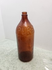 "Jarra vintage de vidrio marrón ámbar en relieve con blanqueador Purex de 10"" x 3,25"" sin tapa"