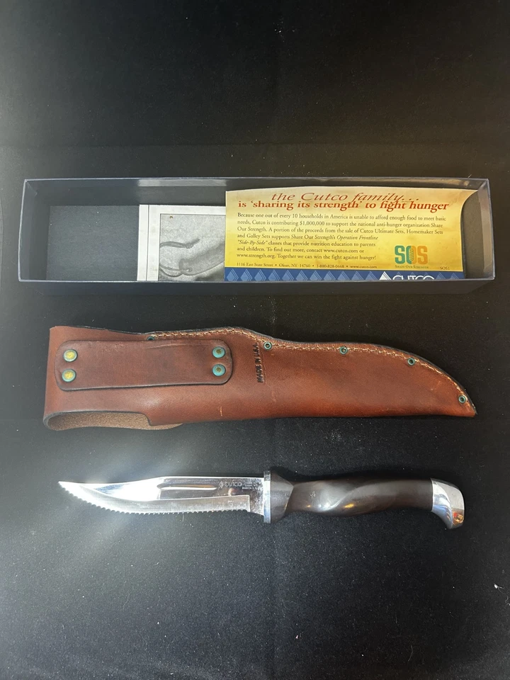 Cuchillo de caza Cutco 1769 hoja fija dentada con funda de cuero nuevo en caja Foto 2 de 2