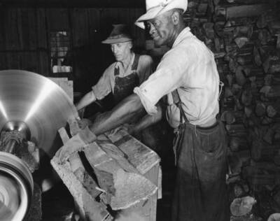 Two men sawing wood for Excelsior Apex Wood Products lumberyard, V Old Photo