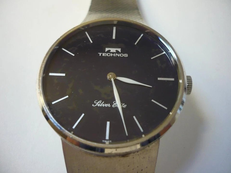 Reloj TECHNOS Esfera Piedra Natural Cuerda Manual Caja Plata 925 33mm Funcionando Años 70 Foto 2 de 4