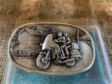 1984 Bergamot Brass Works belt buckle with a Vespa looking motorcycle