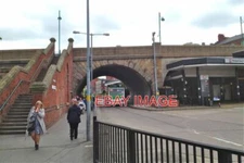 PHOTO  CHESTERGATE EXIT STOCKPORT BUS STATION BUSES LEAVE THE BUS STATION BY THI