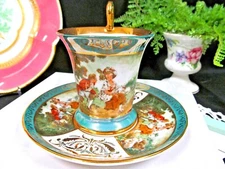 KPM tea cup and saucer courting couple love story pattern gold gilt teacup 1940s