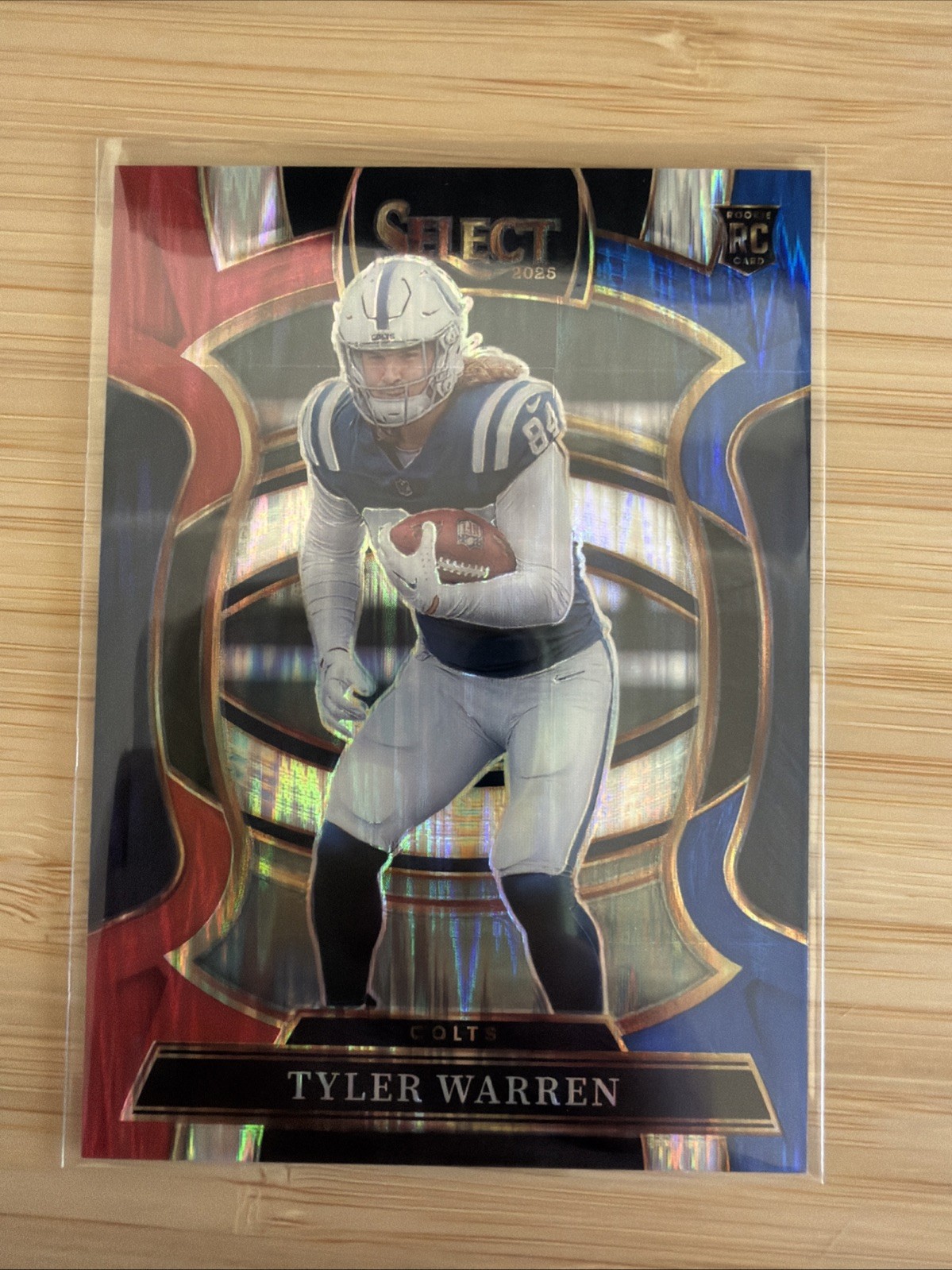 2025 Panini Select - Concourse Tyler Warren #33 Red & Blue Shock Prizm (RC)
