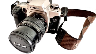 Appareil photo argentique Canon EOS 50 E + objectif 35/105mm - Photo 1/4