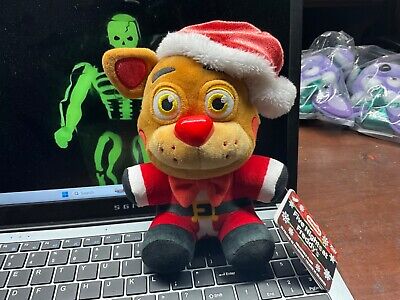 Buy Santa Freddy Plush at Funko.