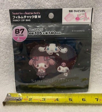 Sanrio Lolita Kuromi My Melody Cinnamoroll 4 pièces petits sacs zippés fantaisie 6" x 5,25"