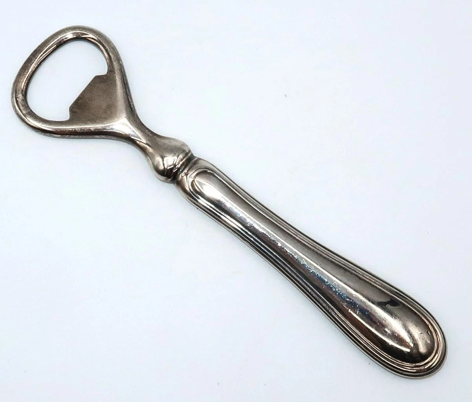 Abridor de botellas de plata vintage OLRI para Neiman Marcus, acero inoxidable, 6" Foto 2 de 4