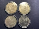 Four 1921 Morgan Silver Dollars