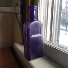 PORTERS CURE OF PAIN CLEVELAND DEEP AMETHYST 1890s  HAND BLOWN MED BOTTLE