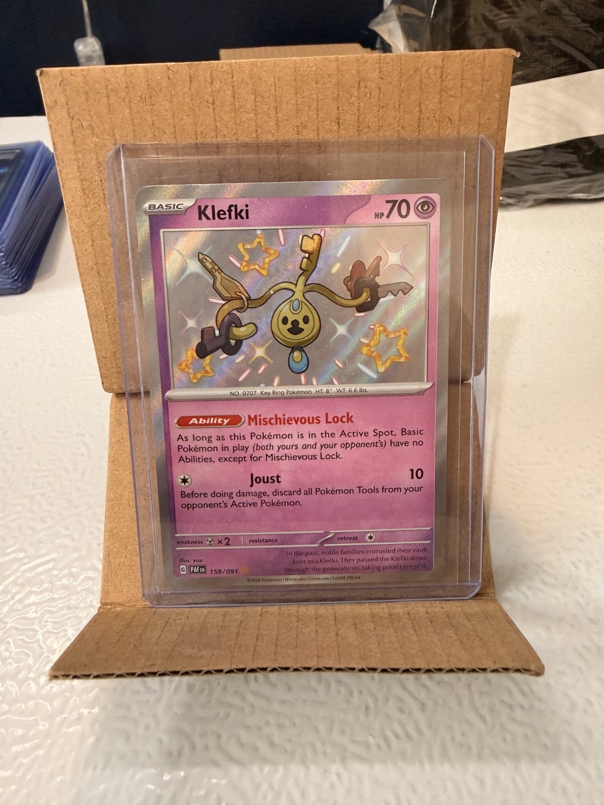 Klefki 159/091 SV: Paldean Fates Holo