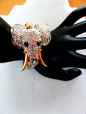 Rhinestone elephant bracelet - clear  green rhinestones - gold tone setting -7"
