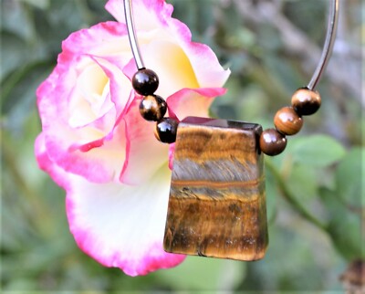 Tiger Eye necklaces a polished semi-precious stone of good luck and prosperity
