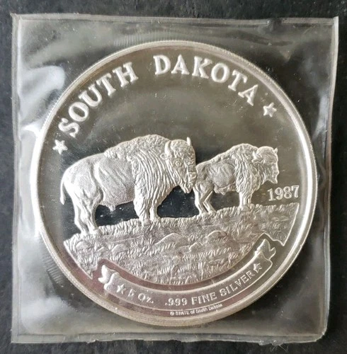 1987 5oz Silver South Dakota Buffalo Round in Plastic
