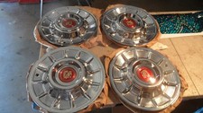 1957 Cadillac Eldorado Hubcaps 4 Restoredpolished W New Center Medallions -ob 1957 Cadillac Eldorado Hubcaps 4 Restoredpolished W New Center Medallions -ob