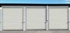 7 NEW IN CRATE 10FTX10FT 6 INCH TRACK RITE ROLL UP DOORS FOR COST
