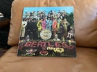 Beatles Sgt. Pepper UK pressing EX w/cutouts fully intact