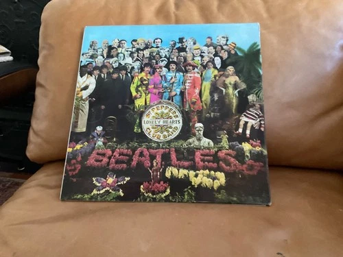 Beatles Sgt. Pepper UK pressing EX w/cutouts fully intact