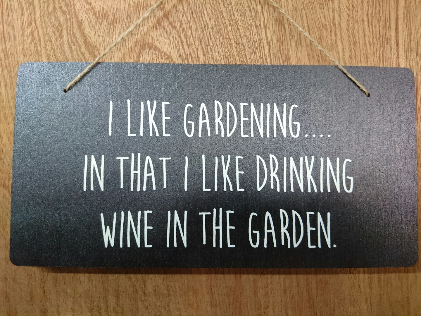 I like gardening in that I like drinking Wine in the garden.  Sign - Plaque