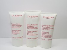CLARINS 3 PC SET - BODY LOTION, BODY SCRUB GENTLE FOAMING CLEANSER DETAILS