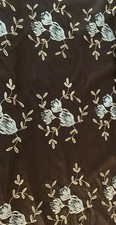 Brown With Blue Tan Embroidered Flowers Fabric