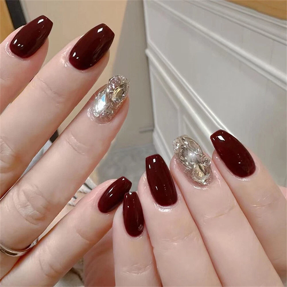 Red nails with sale diamonds