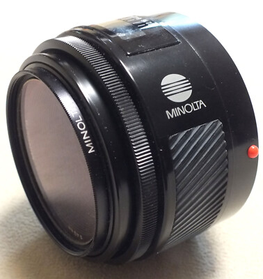 Minolta Maxxum AF 50mm 1.7 Lens w/Minolta AC L35 UV Filter for