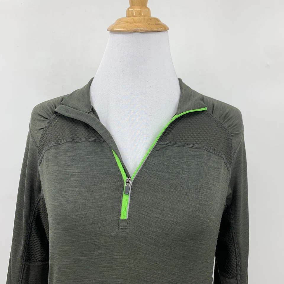 Polo de golf Lija para mujer S pequeño oliva acanalado hombro cuarto cremallera agujeros para los pulgares top Foto 4 de 4