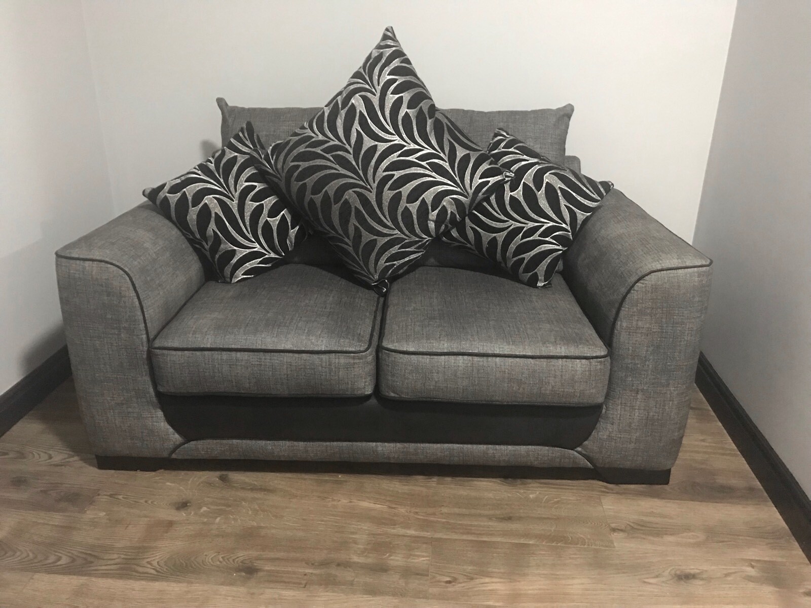 grey sofa black cushions