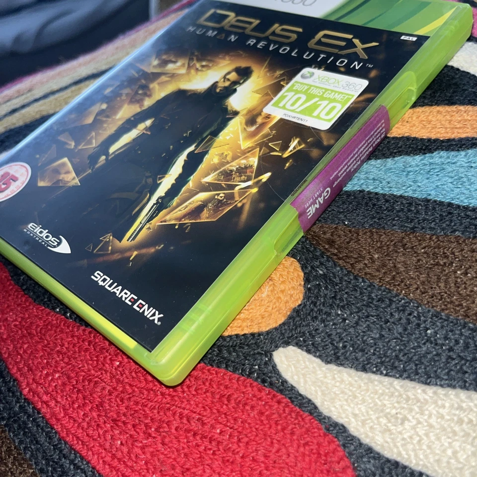 DEUS EX HUMAN REVOLUTION XBOX 360 BRAND NEW Sealed game sticker  - Image 2 of 4