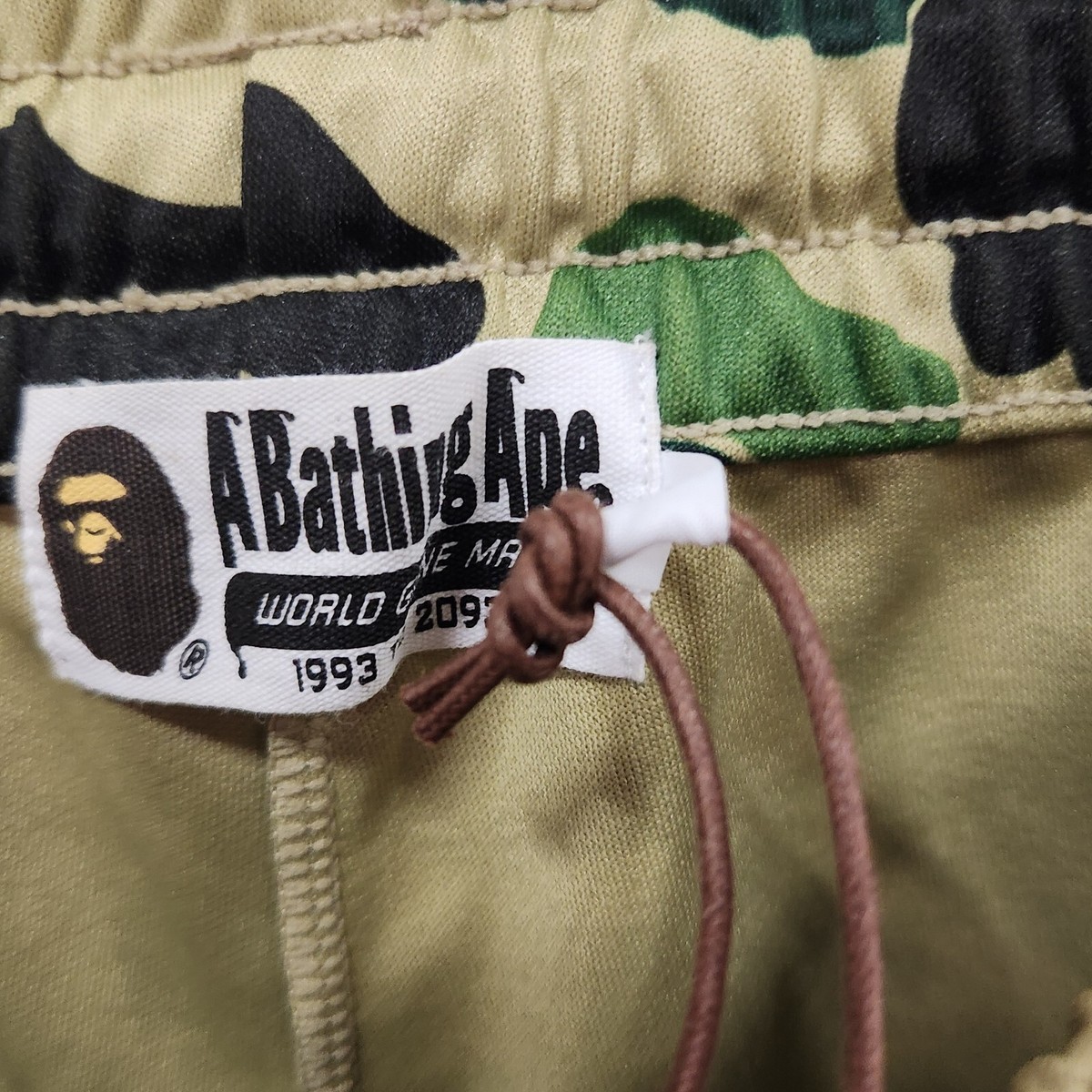 A BATHING APE World Gone Mad BAPE CAMO LOGO SIDE TAPED PANTS BLACK