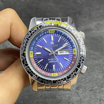 Rare montre homme RICOH Worldtimer automatique cadran bleu jour date vintage ... - Photo 1/4
