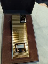 Vintage Sunnex Flat Gold Tone LCD Lighter