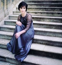 Enya Unsigned 8" x 8" Photo - Irish singer - Donation to Cancer Charity *C