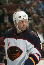 Greg de Vries Atlanta Thrashers looks on at the game v the M- Ice Hockey Photo